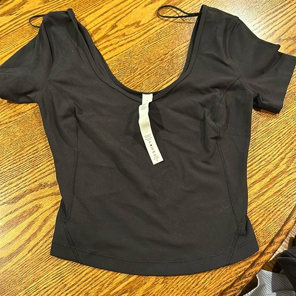 Align t shirt size two like new condition black with rip tag attached - Picture 1 of 3